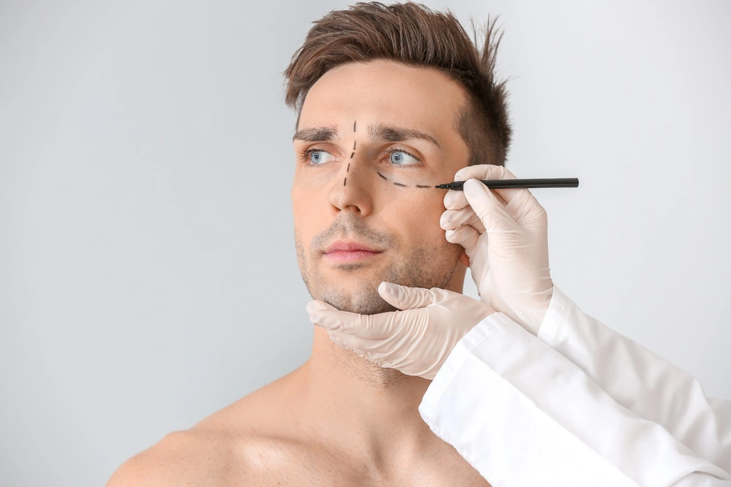 Man gets blepharoplasty at Aestique